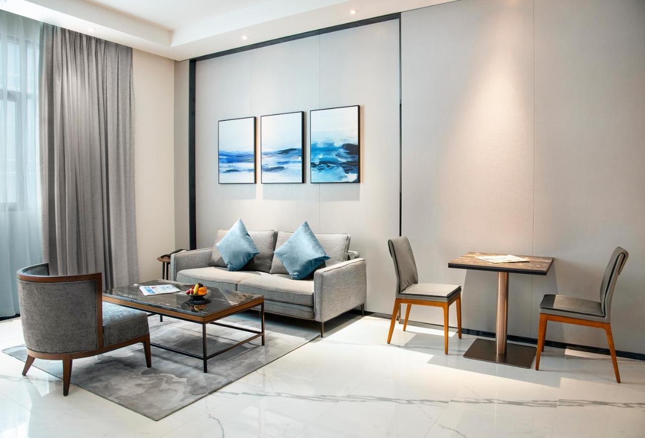 Asiana Grand Hotel Dubai Luaran gambar A living room at the hotel