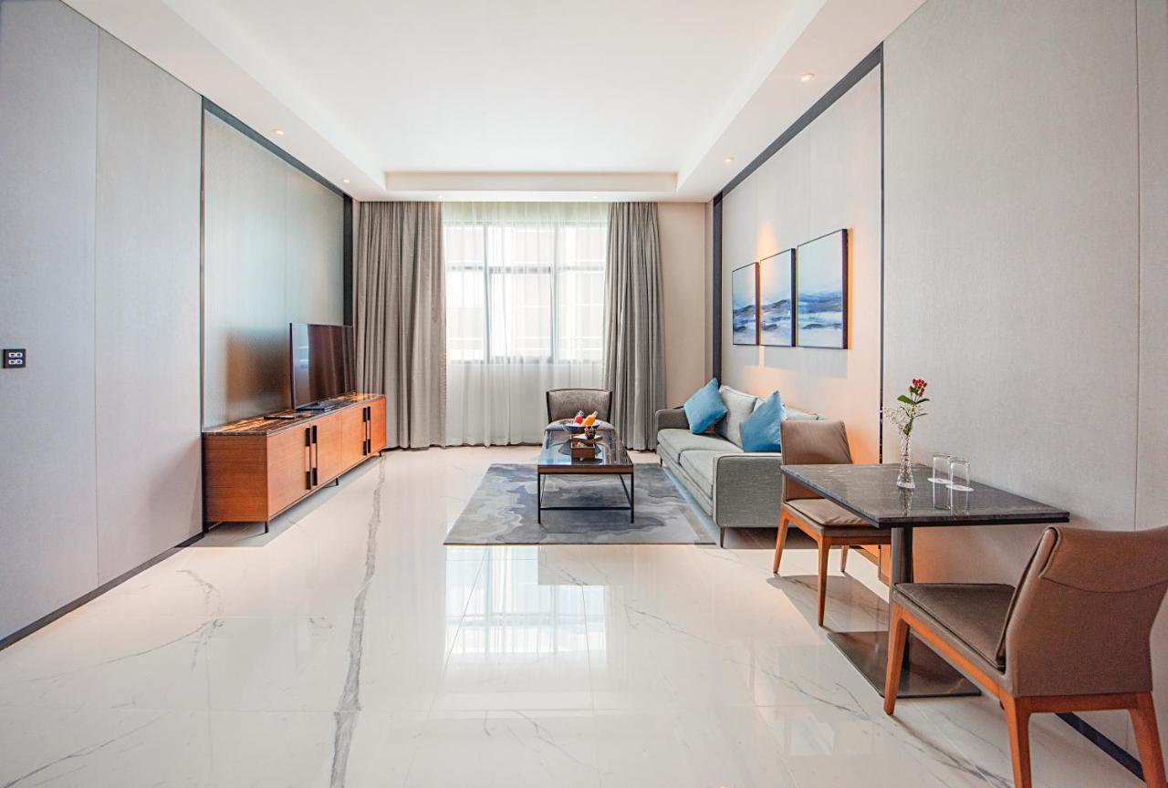 Asiana Grand Hotel Dubai Luaran gambar A living room in a serviced apartment in Beijing, China