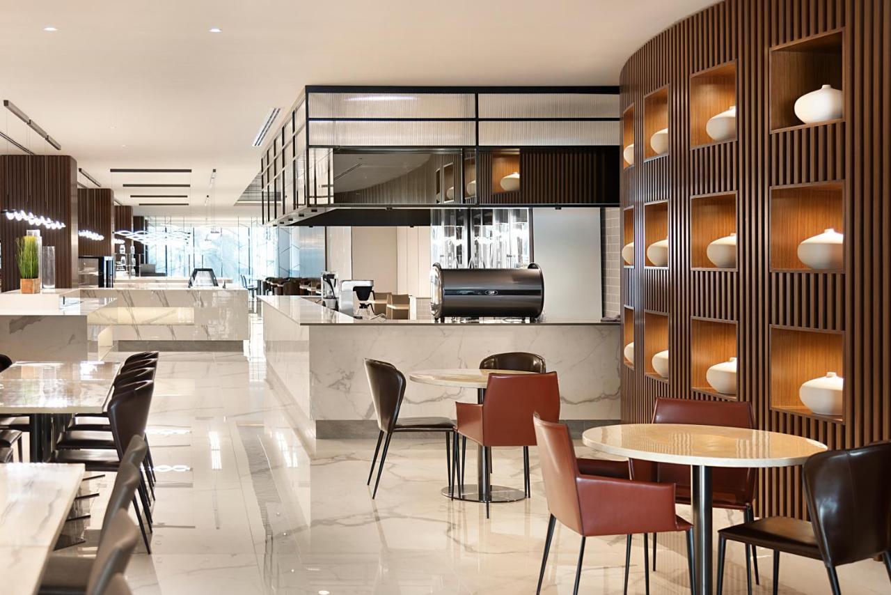 Asiana Grand Hotel Dubai Luaran gambar The lounge at the airport