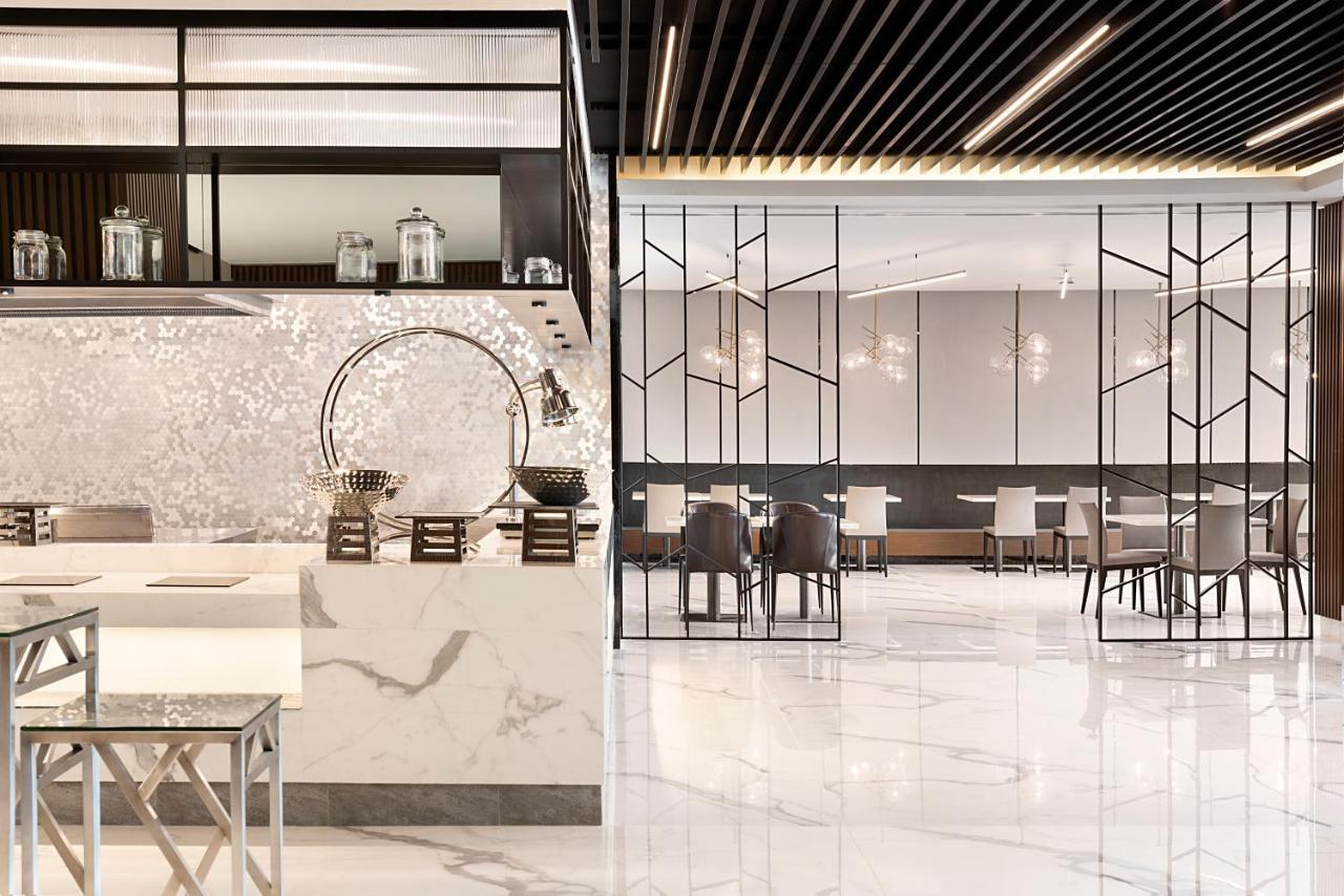 Asiana Grand Hotel Dubai Luaran gambar The interior of the restaurant