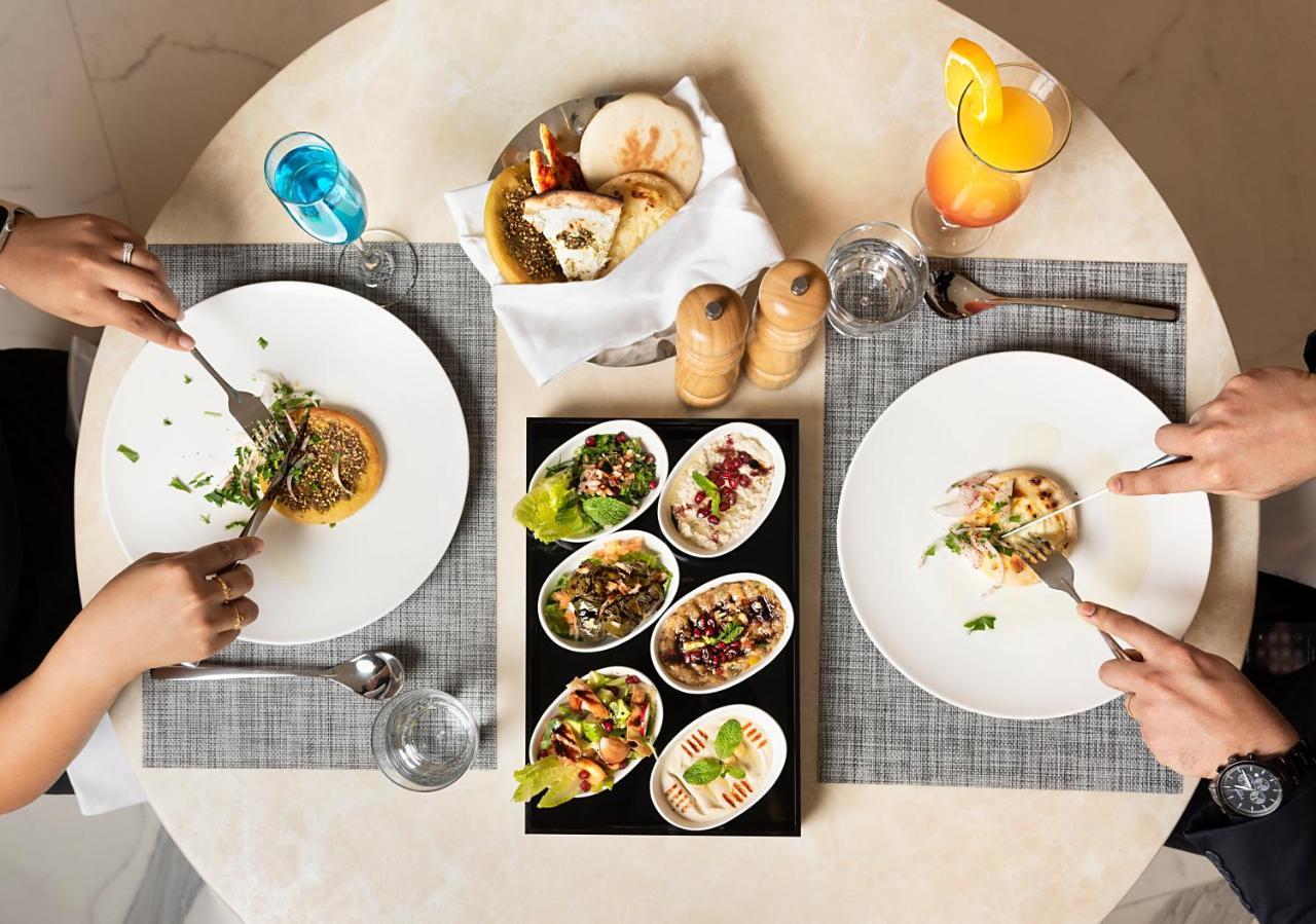 Asiana Grand Hotel Dubai Luaran gambar A selection of meze